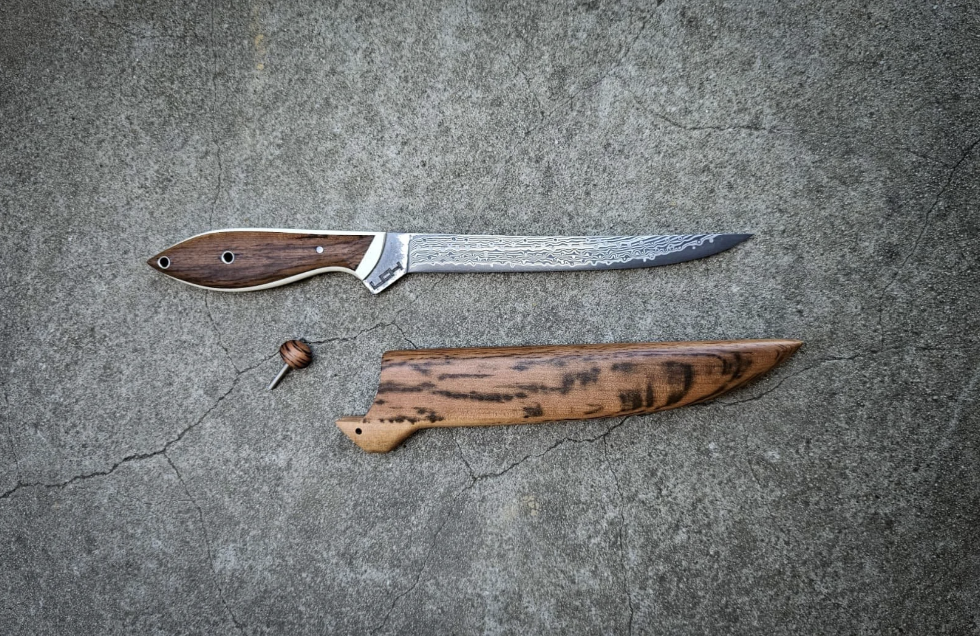Damascus fillet knife with wooden sheath